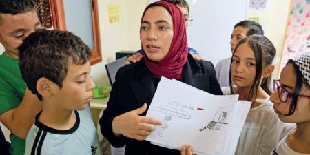 مركز فنون في الضفة الغربية يمنح أطفالا فلسطينيين مساحة للحلم رغم نقاط التفتيش